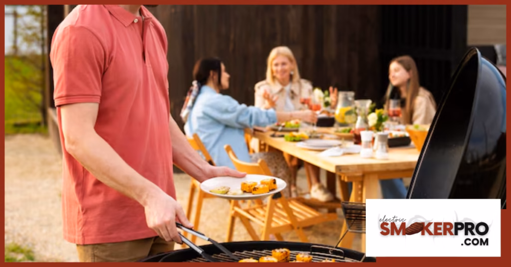 Man grilling food at a backyard cookout on an outdoor barbecue.